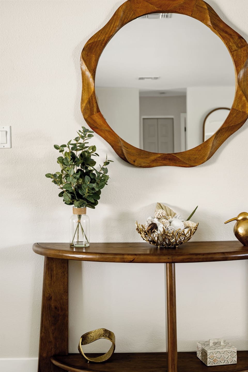 Elegant entryway décor featuring designer accents and a welcoming modern aesthetic.