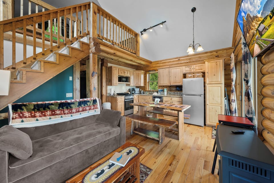 Main Level Living Room, Kitchen, and Dining. Living Room Couch Pulls Out to a Double Bed