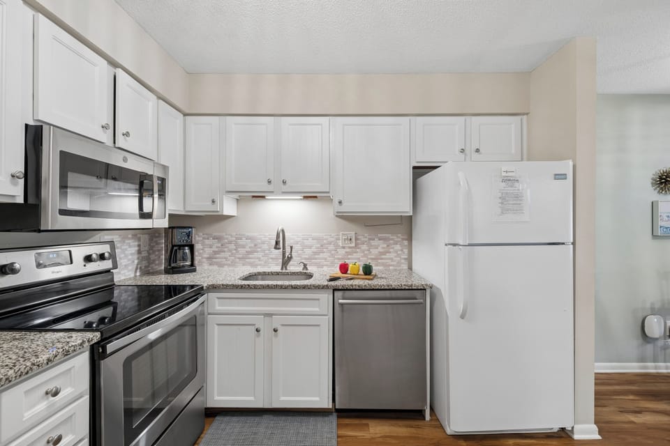 Fully equipped kitchen with modern appliances and ample counter space