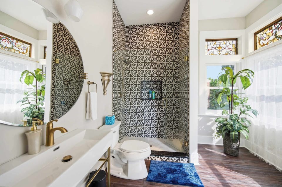 A stylish single vanity & tiled shower await in Suite 4’s sophisticated ensuite​