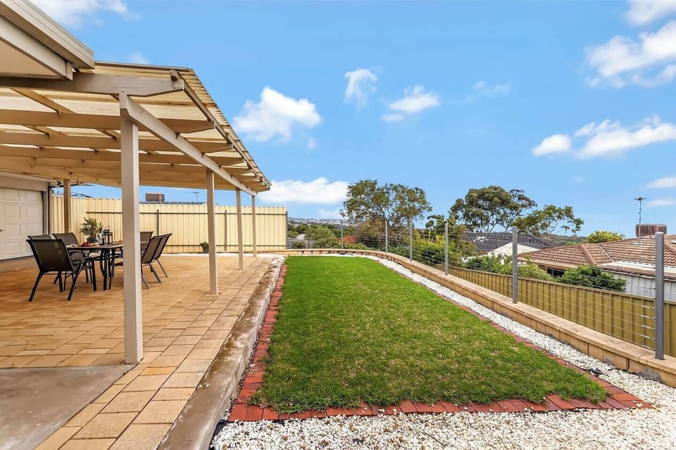 Spend sunny afternoons in the private backyard, with plenty of space to play, while the covered patio provides a comfortable spot to relax and enjoy the fresh coastal air.
