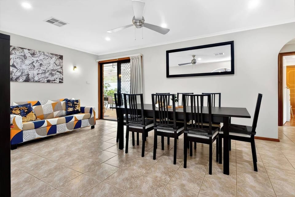 Stretch out with a book, enjoy a quiet coffee or keep the conversation flowing in this secondary lounge connected to the home's social spaces.