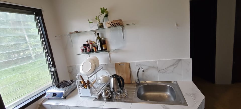 Kitchen countertop with coffee and meal preparation space