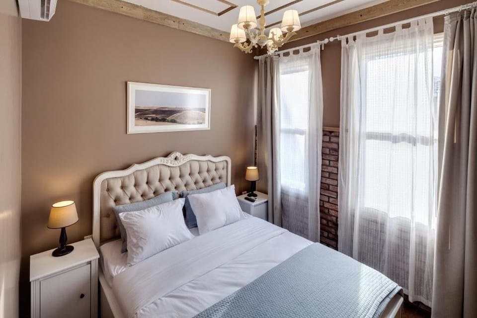 Economy Double Room, City View | In-room safe, blackout drapes, soundproofing, iron/ironing board