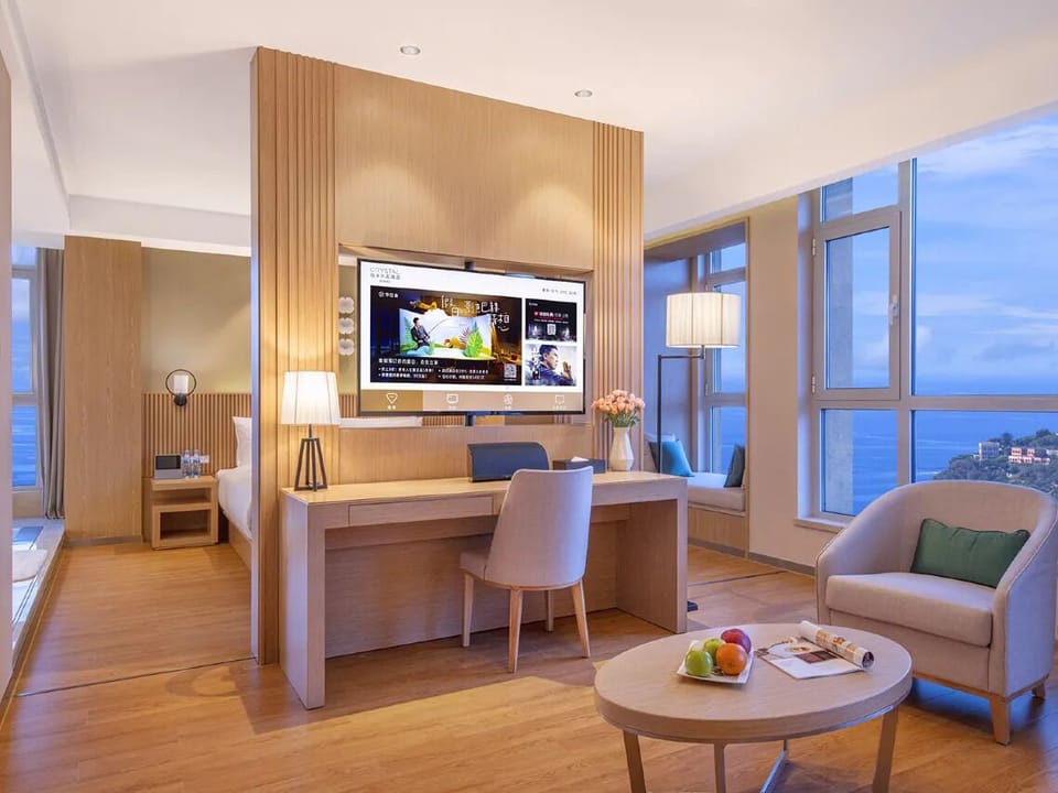 Premier Double Room, Partial Sea View | Down comforters, in-room safe, desk, laptop workspace