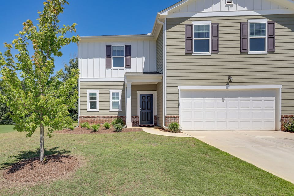 Property Exterior | Furnished Patio | Spacious Yard
