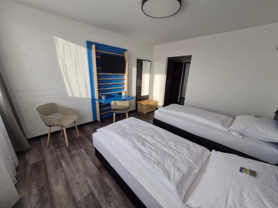Standard Double Room, City View | Desk, laptop workspace, blackout drapes, free WiFi