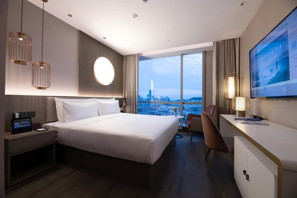 Basic Room, City View | Down comforters, minibar (free items), desk, laptop workspace