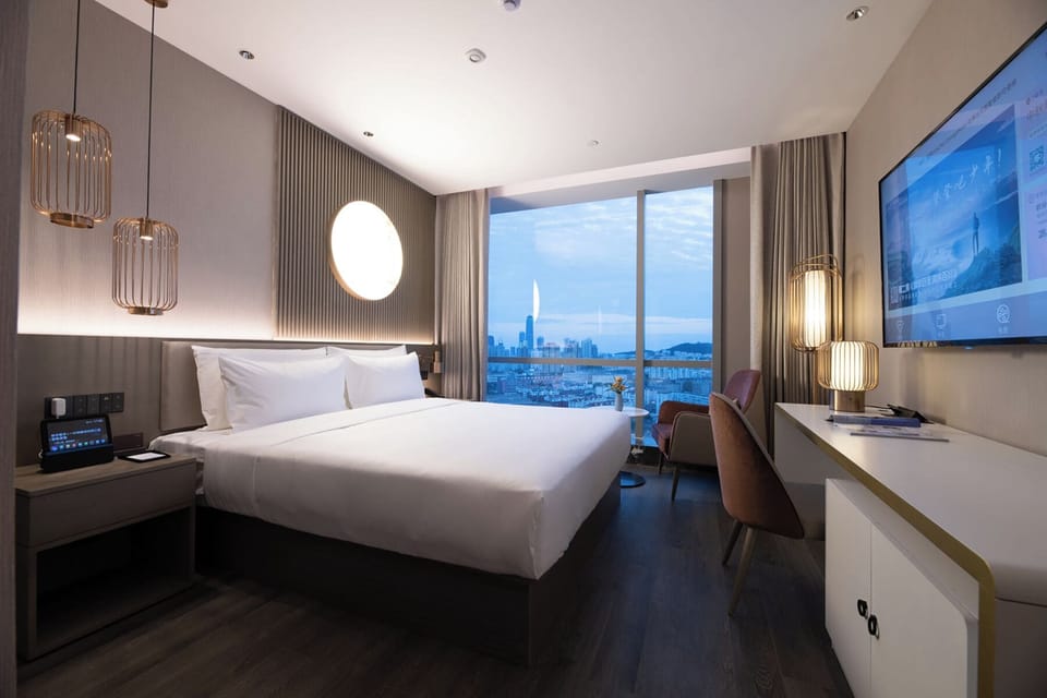 Superior Room, City View | Down comforters, minibar (free items), desk, laptop workspace