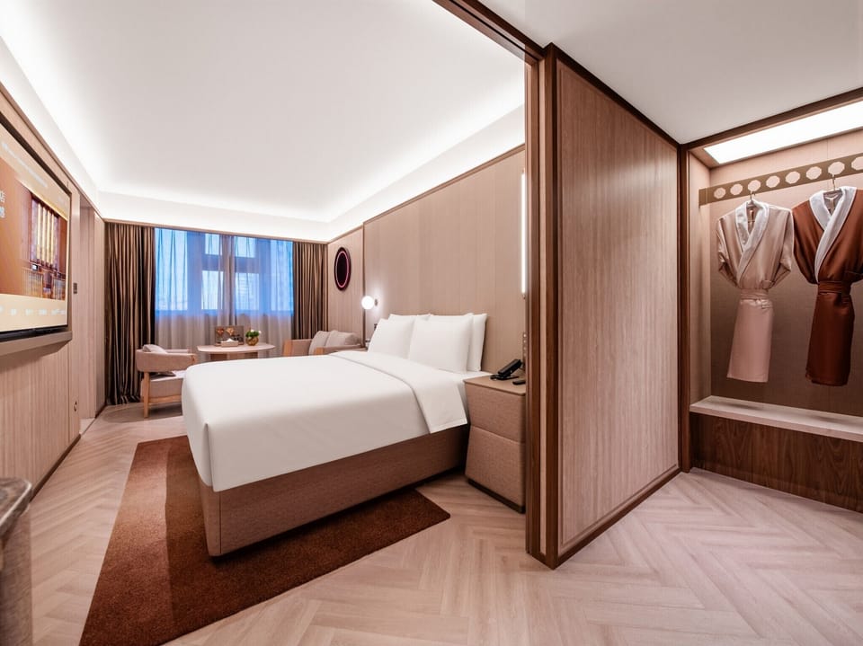 Premium bedding, memory foam beds, minibar (free items)