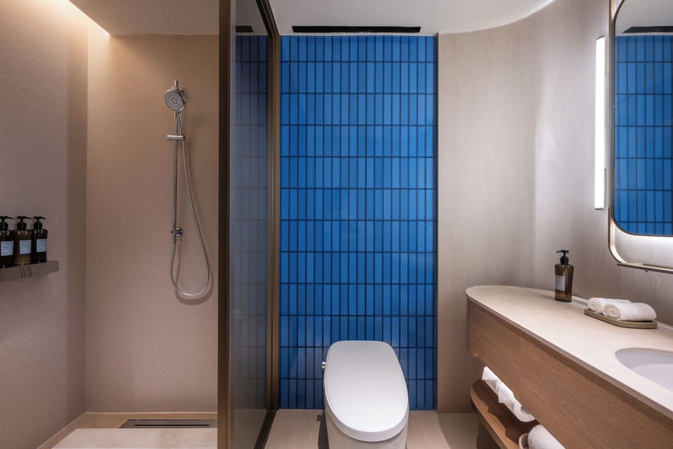 Basic Double Room Single Use, Non Smoking, Air conditioning | Bathroom | Shower, hair dryer, slippers, towels