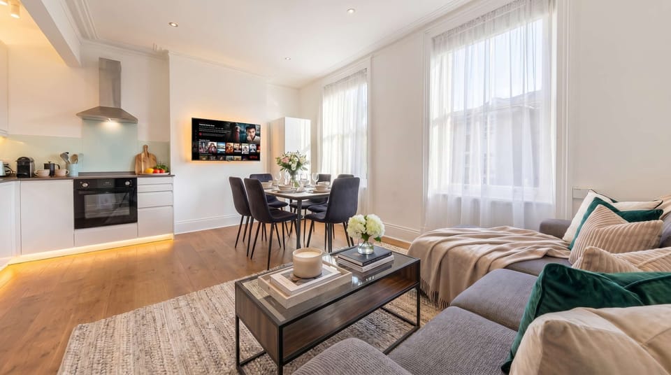 Relax in the spacious living area with chic, modern decor.
