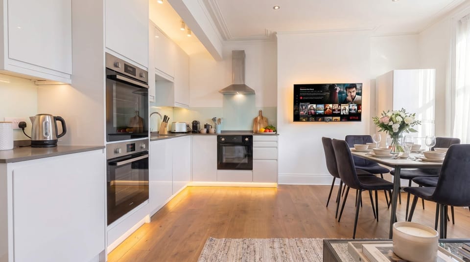 Cook and entertain in a modern kitchen with sleek appliances.