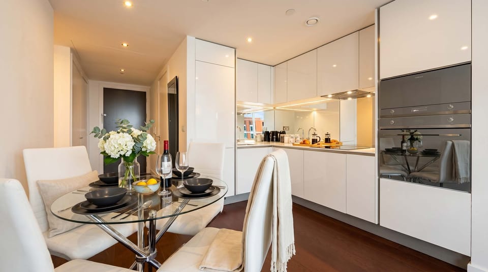 Dine in style with a modern, open-plan kitchen and dining area.