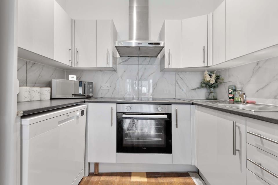 Prepare your favorite meals in a well-equipped kitchen designed for a comfortable stay.
