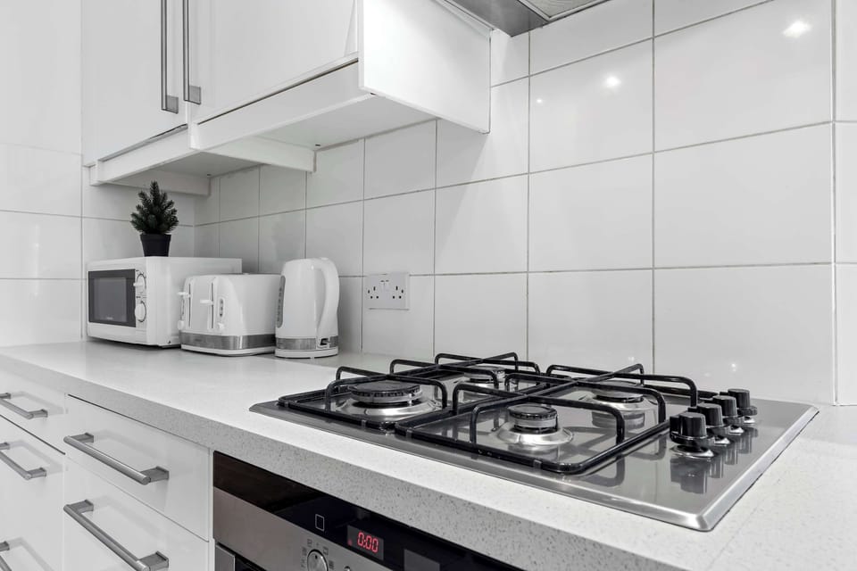 Modern kitchen equipped for gourmet cooking and entertaining.