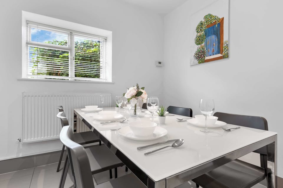 Dine in style with a view of the lush garden.