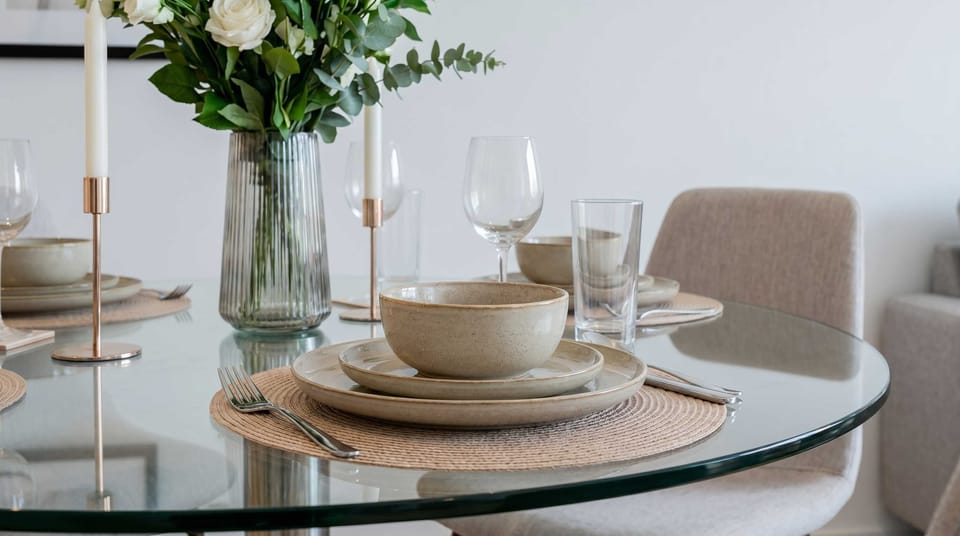 Experience fine dining ambiance with beautifully arranged table settings.