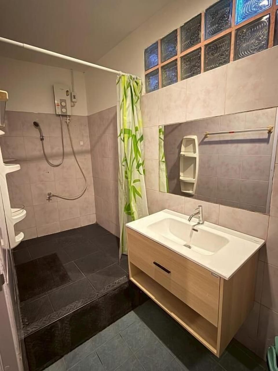 Economy Quadruple Room, Courtyard View | Bathroom | Shower, towels, soap, shampoo