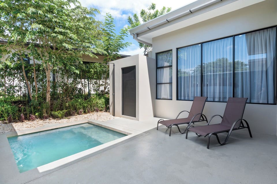 Another view of the private backyard pool, showing the seamless connection to the outdoor living spaces. Just a short walk to the beach from this premier Tamarindo vacation villa.