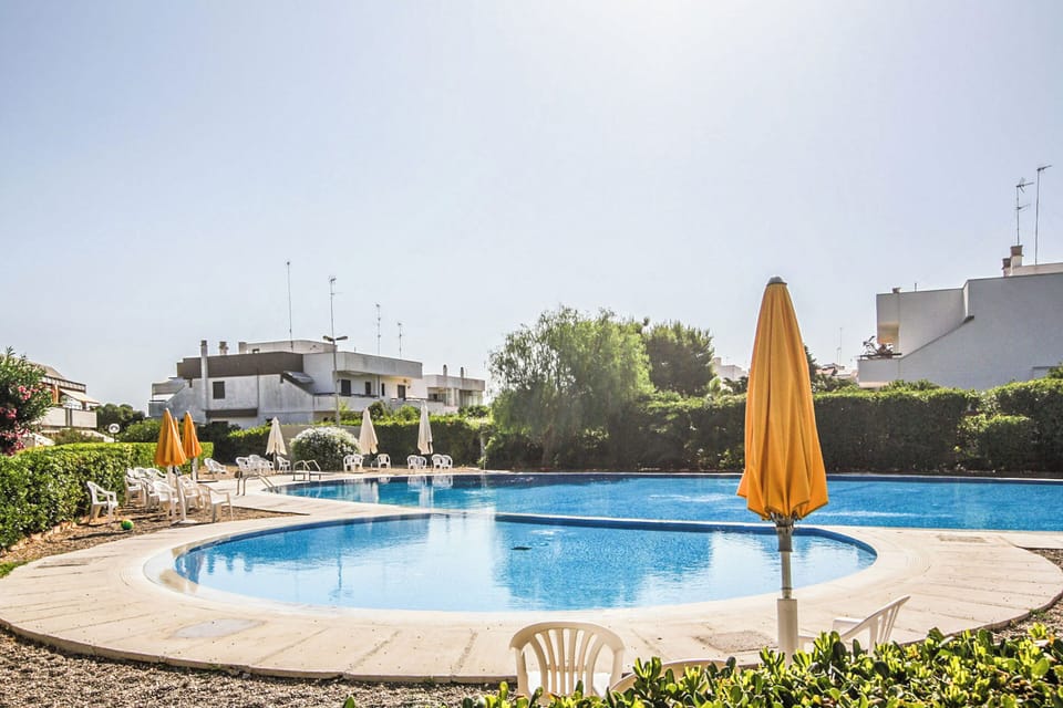 Apartment, Balcony | Pool | Seasonal outdoor pool