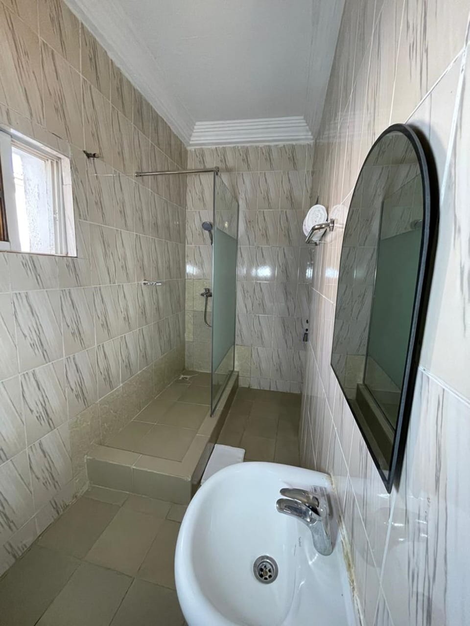 Shower, towels, toilet paper