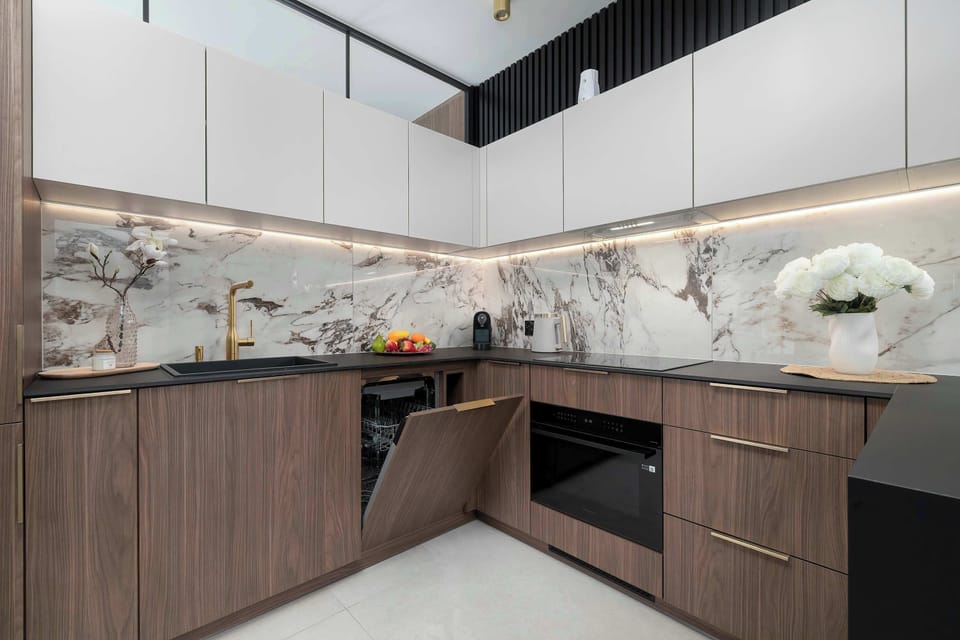 Modern gourmet kitchen featuring high-end appliances and a sleek contemporary design.