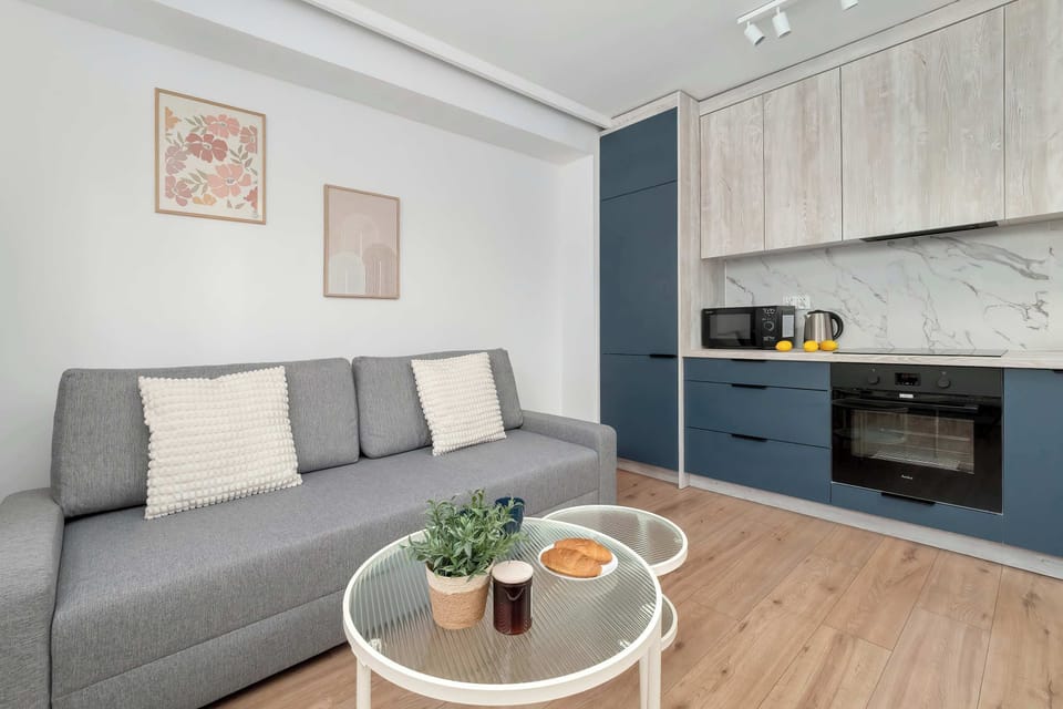 Elegant living room showcasing modern furnishings and thoughtful interior styling.