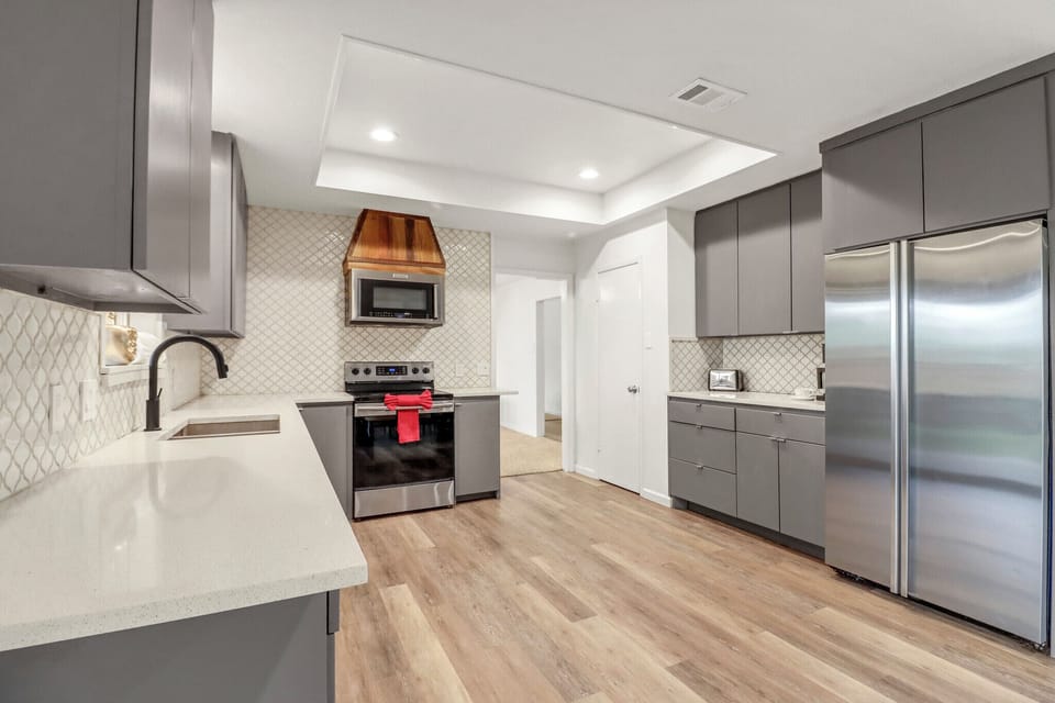 Modern and spacious kitchen with stainless steel appliances