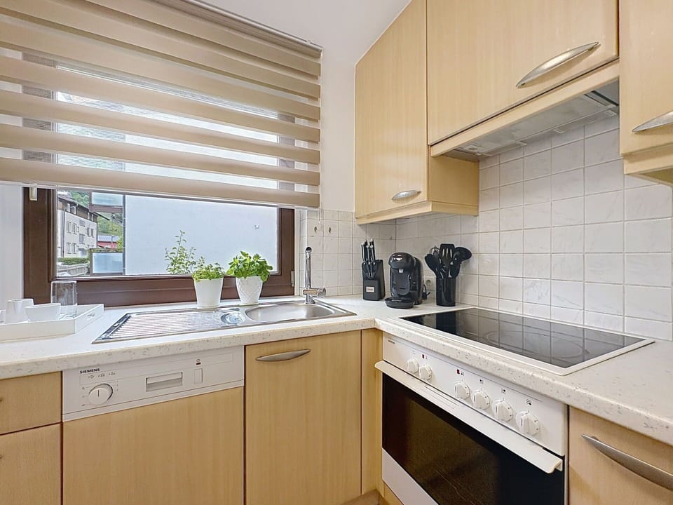 Kitchen, Countertop, Interior Design, Wood, Kitchen Appliance, Cabinetry, Furniture, Home, Flooring, Major Appliance