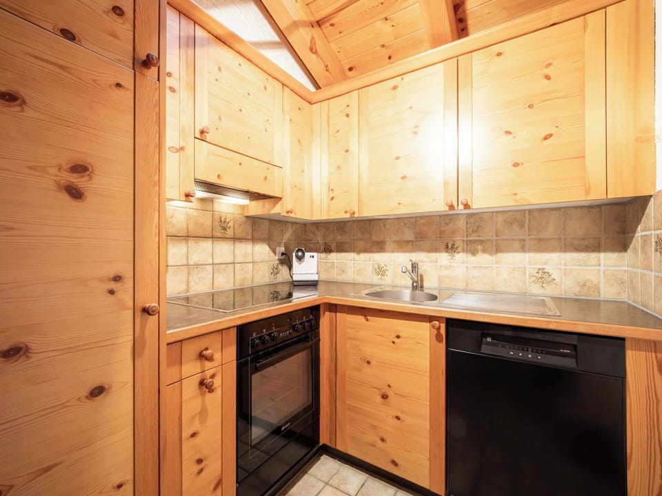 Wood, Cabinetry, Kitchen, Flooring, Countertop, Ceiling, Floor, Wood Stain, Drawer, Hardwood