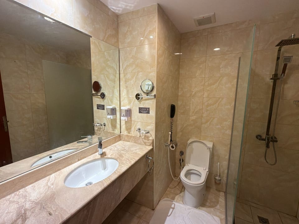Shower, free toiletries, hair dryer, towels