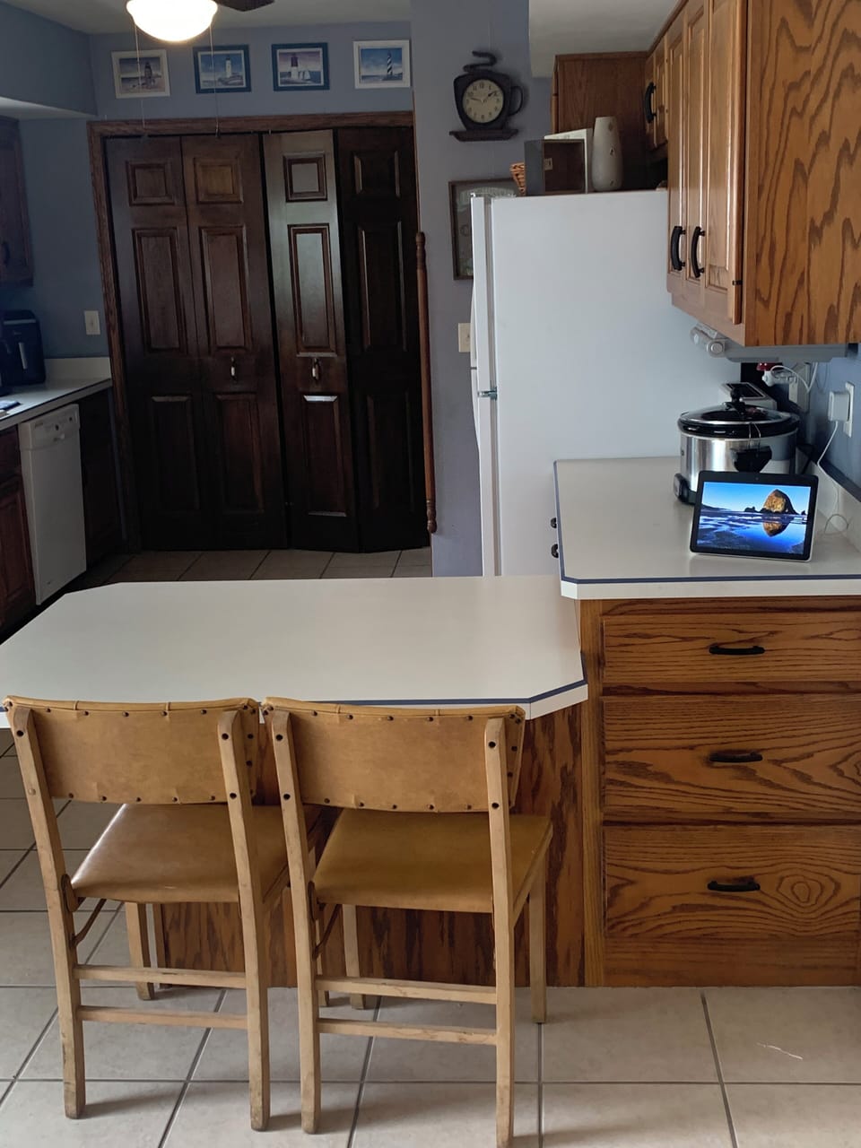 Kitchen with lower counter and chairs 