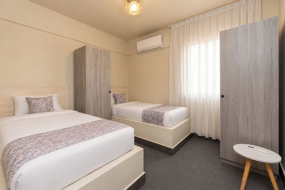 Standard Twin Room | In-room safe, desk, blackout drapes, soundproofing