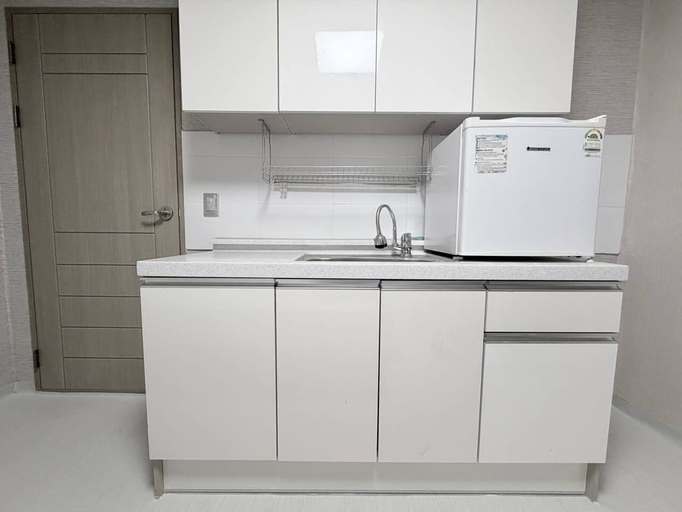 Standard Double Room, City View | Private kitchen | Fridge