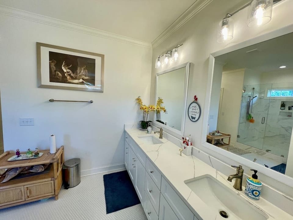 Primary, en suite bathroom with walk in shower.