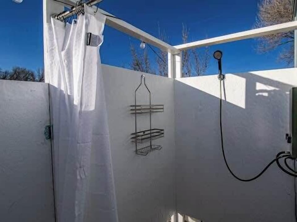 shower, hand held showerhead, summer, outdoor, outdoor space, daytime