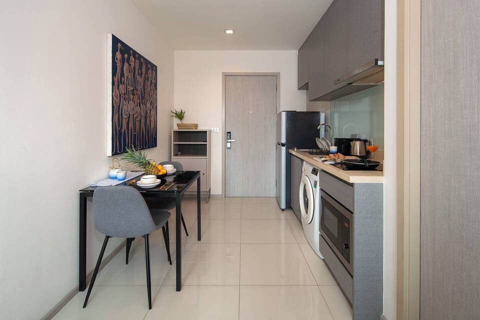 Now you’re standing in the middle of the room. The entrance is secured with a keycard . We’ve also provided a storage space for your shoes to keep things neat and organized.