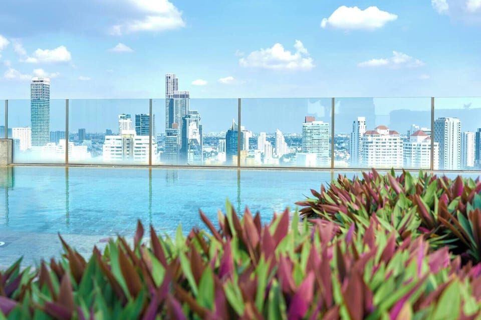 Enjoy your swim in the infinity pool located on the 30th floor, offering breathtaking panoramic views for a truly luxurious experience.