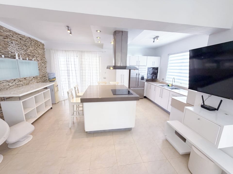 Superior Apartment, Pool View | Private kitchen | Coffee/tea maker, fridge, stovetop, cookware/dishes/utensils