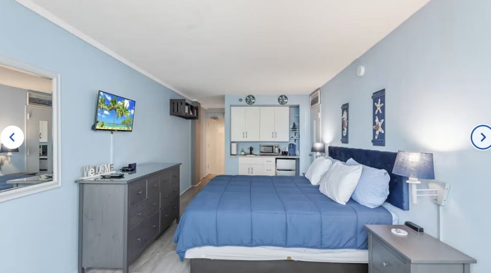 Kitchenette includes mini fridge, Keurig, and microwave