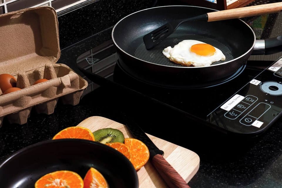 Easy-to-Use Stove & Thai Cooking Basics:The electric stove is labeled in English for easy and safe use. We’ve also stocked basic cooking ingredients, so you can try simple Thai recipes right in our kitchen.