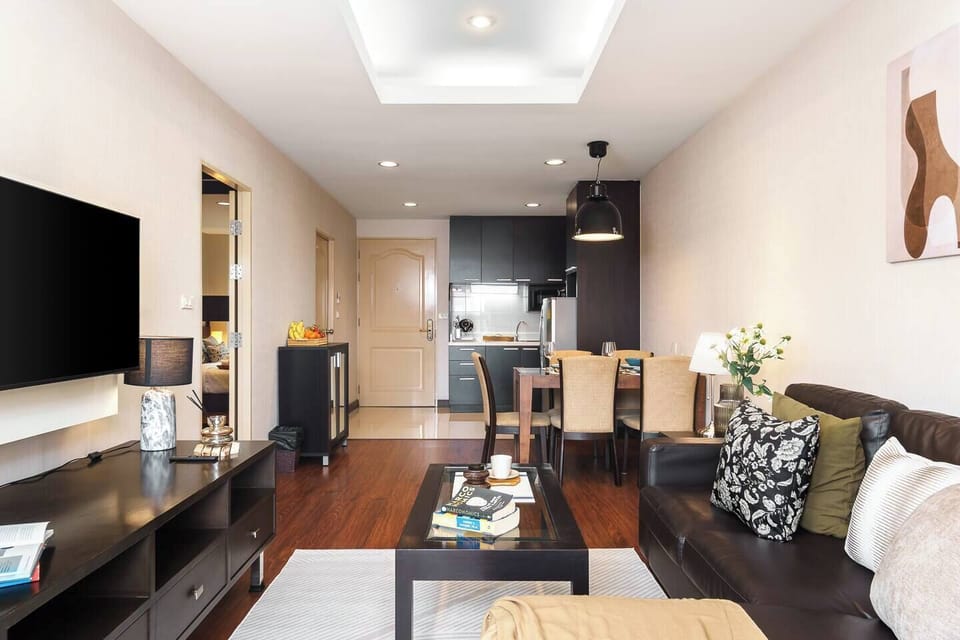 The black cabinet on the left provides plenty of space to store your shoes and other belongings like keys. 