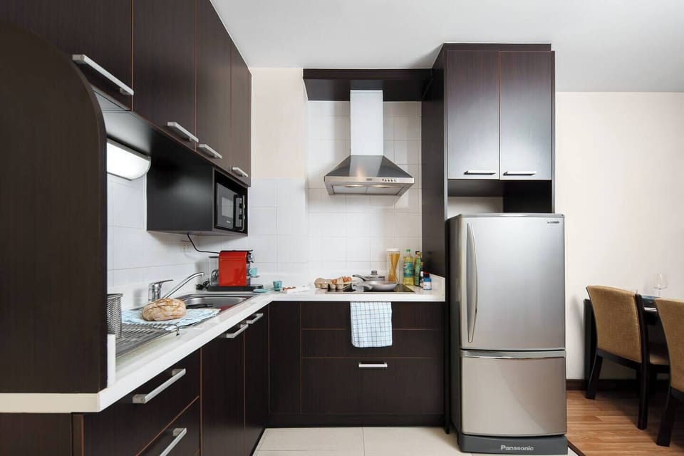 Open kitchen where you can cook and hang out with your companions, all while enjoying music or a show on the smart TV nearby.