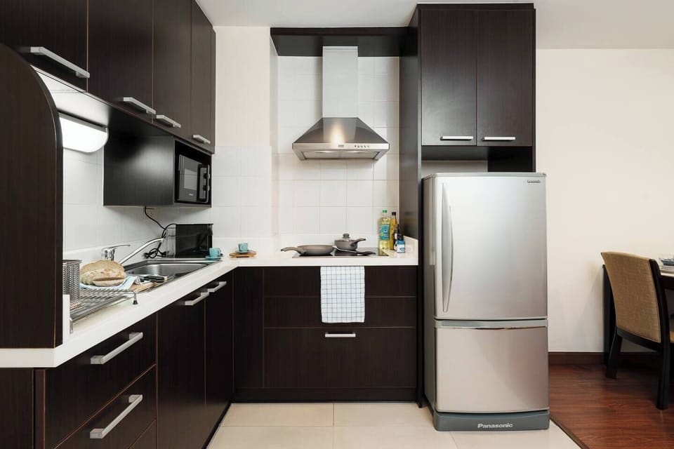 Fully equipped kitchen where you can prepare meals throughout the day. Includes pots, pans, bowls, knives, microwave, kettle, coffee machine, and a full-size fridge.
