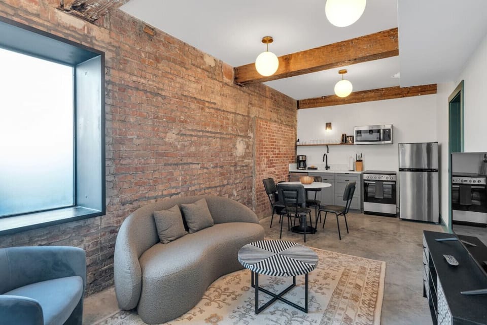 Living room, dining area and kitchen