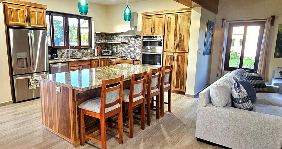 Modern and open concept Kitchen,  with all the essentials that you need to cook.