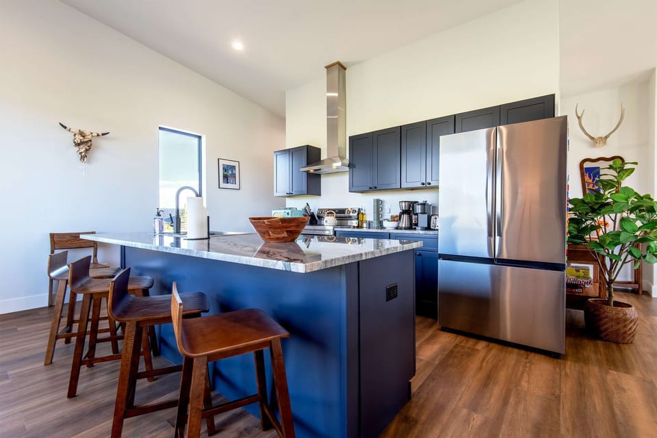 Cook at the island, then pull up a stool and eat with your crew.