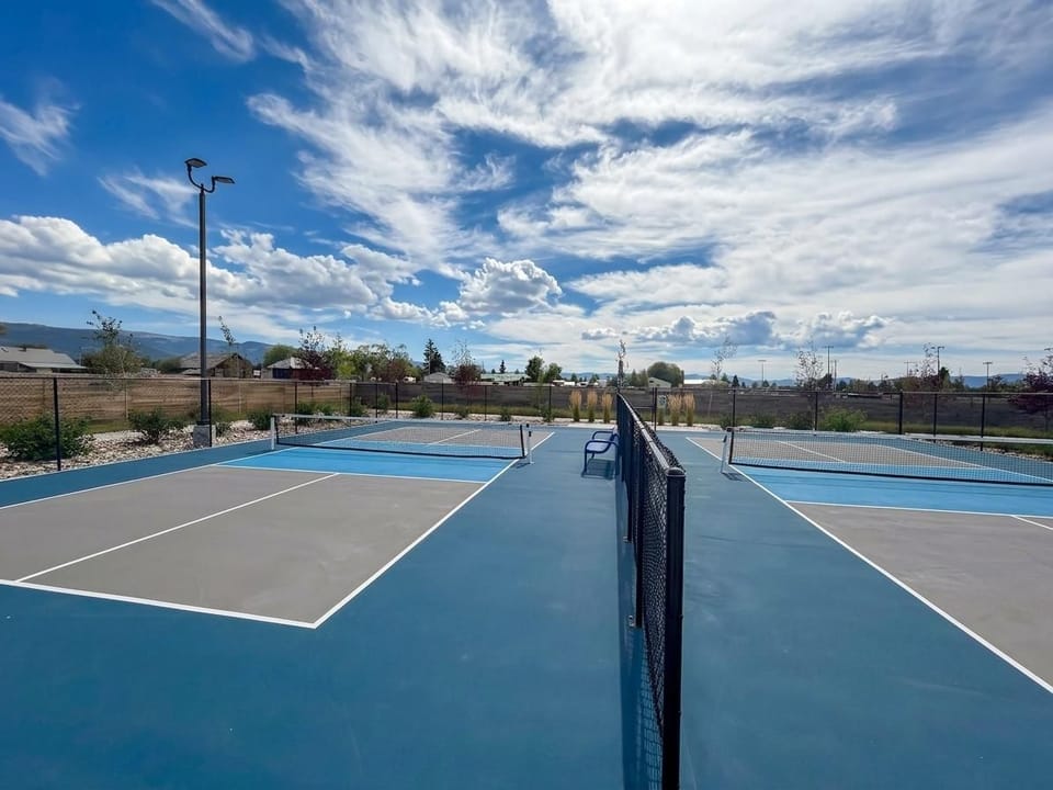 Fresh outdoor pickleball courts with open views and plenty of space to play