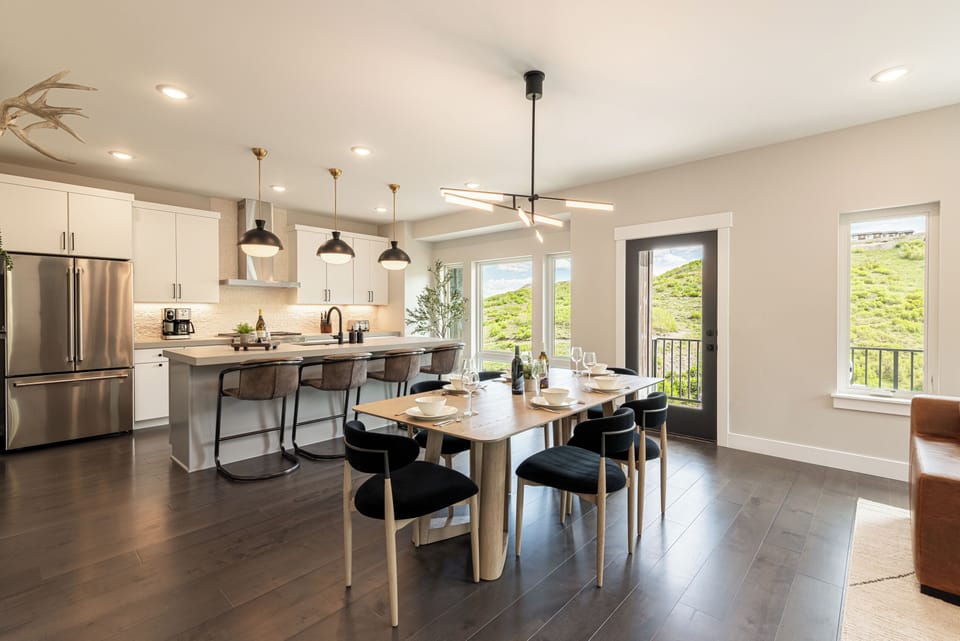 Dining table with seating for six and bar seating for four